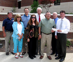 Pictured from left to right (front row) Clara Hankins, Bonnie Hankins, Al Hankins, Dr. Jim Haffey, (back row) Lee Hankins, Jerry Pegg, Dr. Don Phillips, and Jack Holmes.